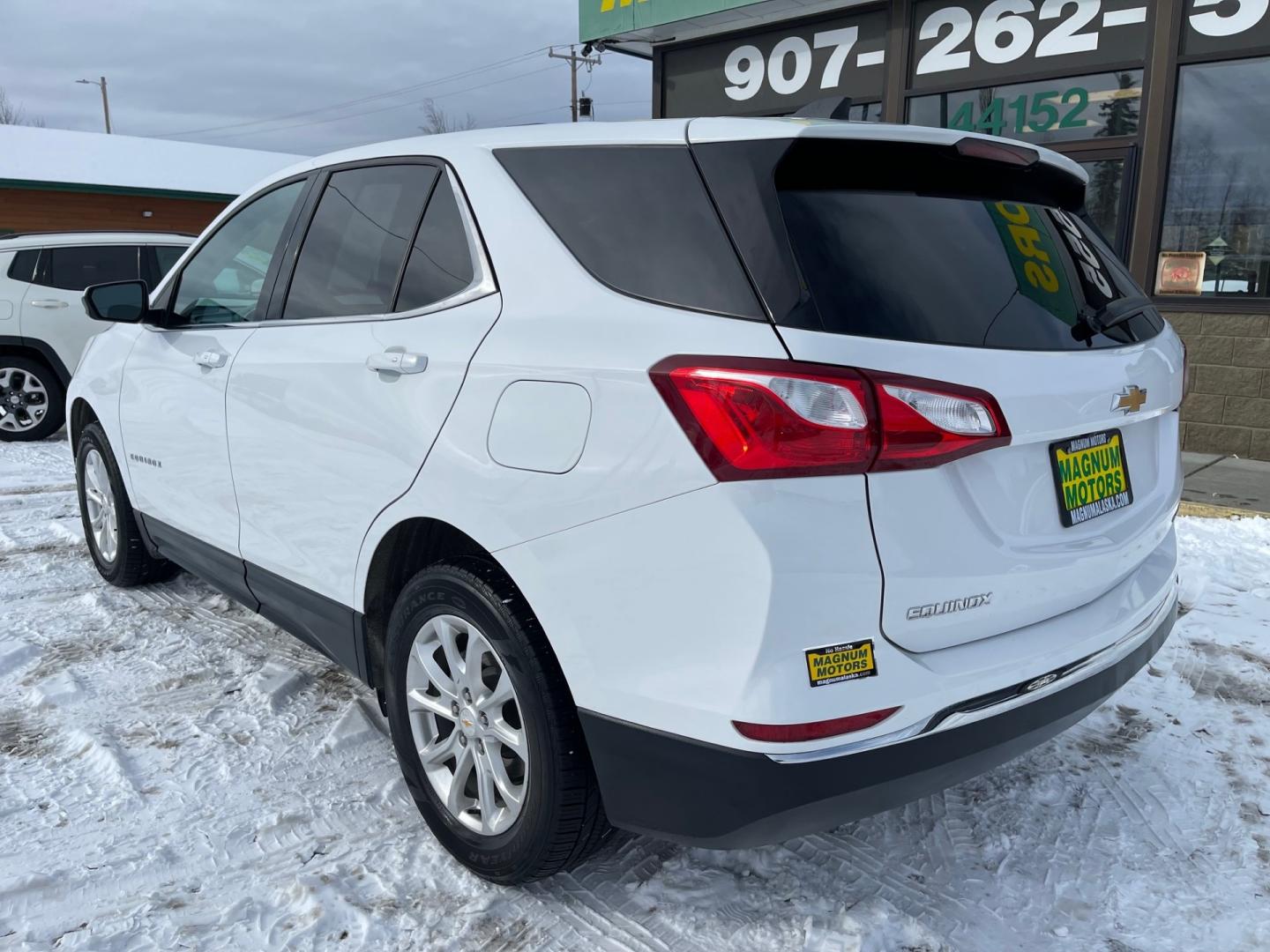 2018 White /Black Chevrolet Equinox LT (2GNAXSEV4J6) with an 1.5L 4 cyl engine, AUTO transmission, located at 1960 Industrial Drive, Wasilla, 99654, (907) 274-2277, 61.573475, -149.400146 - Photo#2